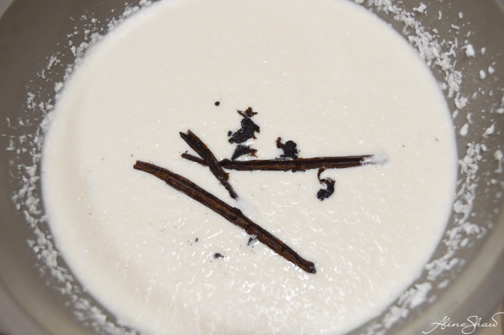 Vanilla bean, cloves and more in the coconut and milk mixture