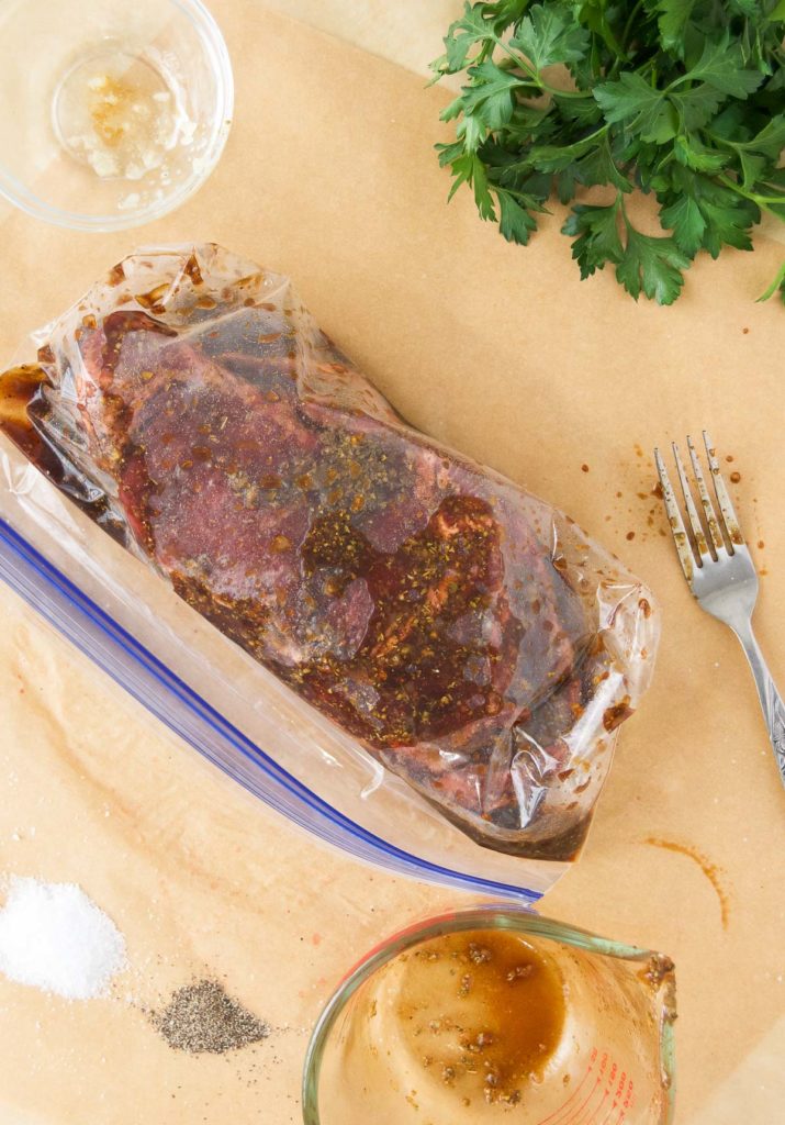 Steaks in marinade in a plastic bag