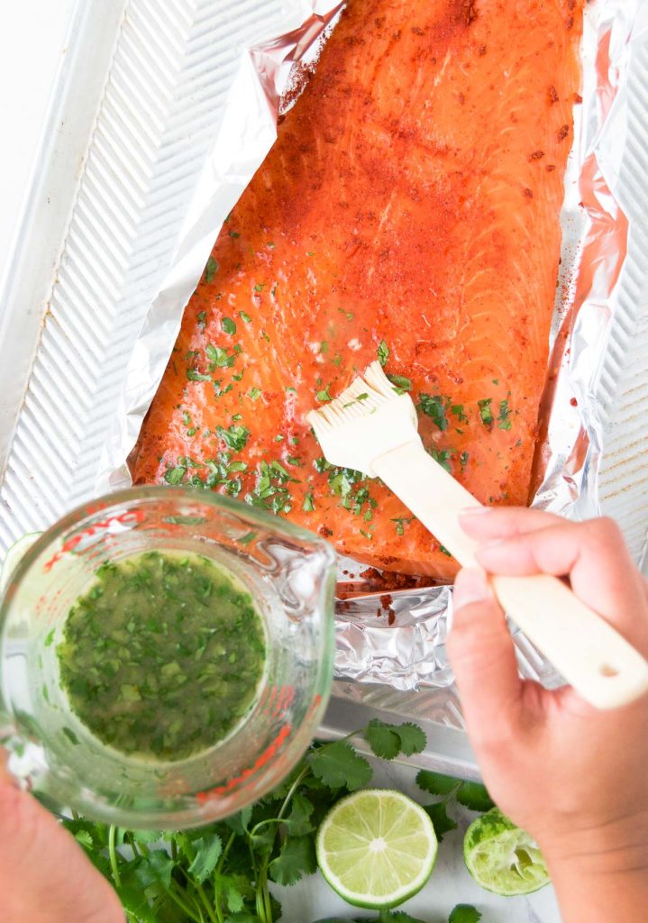 Basting lime salmon with honey-butter and cilantro