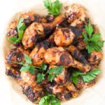A bowl full of Beer Marinated Grilled Drumsticks