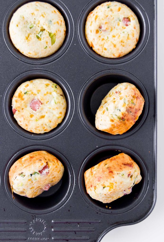 Baked Savory Breakfast Muffins in a dark metal muffin tin
