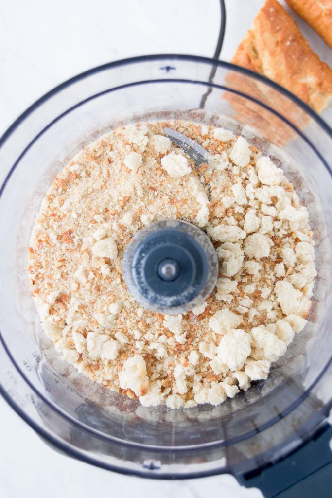 Homemade bread crumbs in a food processor from above